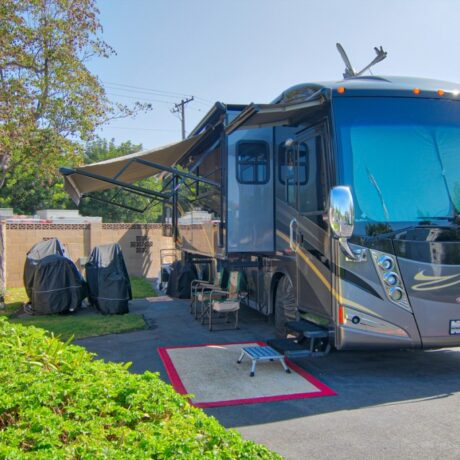A large RV parked at one of the premium sites, showcasing the park’s big rig-friendly accommodations at Orangeland RV Park in Orange, CA.