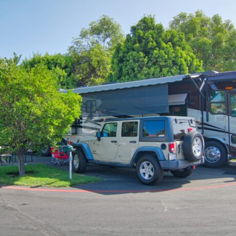 A large RV parked at one of the premium sites, showcasing the park’s big rig-friendly accommodations at Orangeland RV Park in Orange, CA.