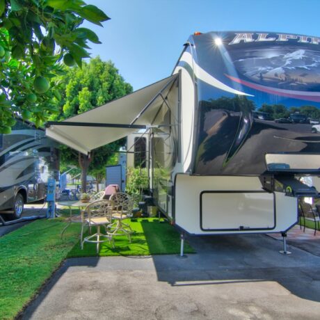 A large RV parked at one of the premium sites, showcasing the park’s big rig-friendly accommodations at Orangeland RV Park in Orange, CA.